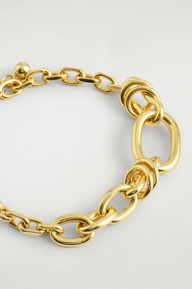 Браслет из асимметричных звеньев COS
