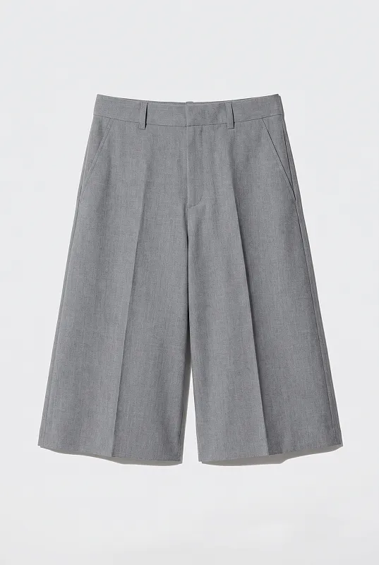 Элегантные брюки-кюлоты UNIQLO Элегантные брюки-кюлоты UNIQLO