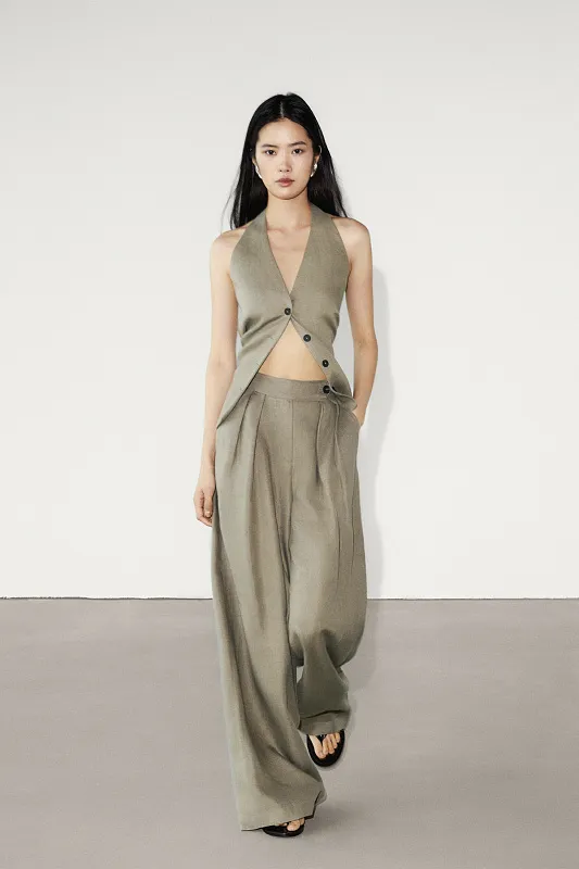 Льняные брюки с двойными защипами