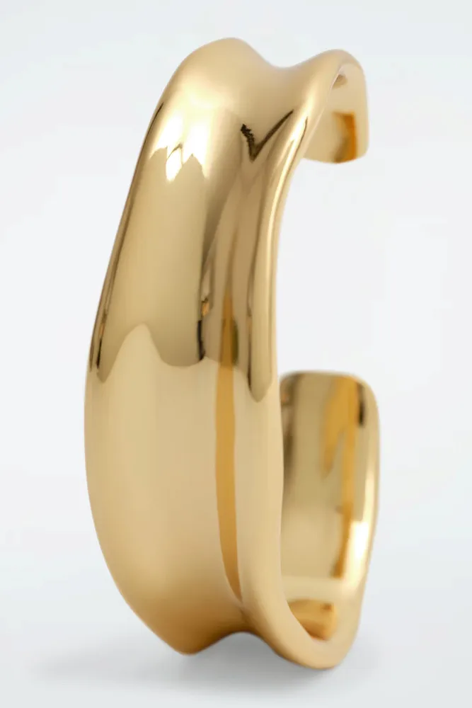 Тонкий скульптурный браслет COS