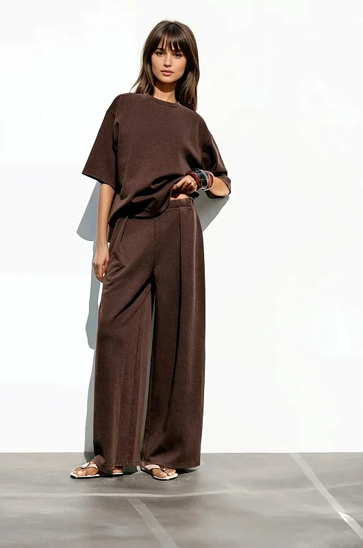 Брюки из интерлока с эффектом потертости