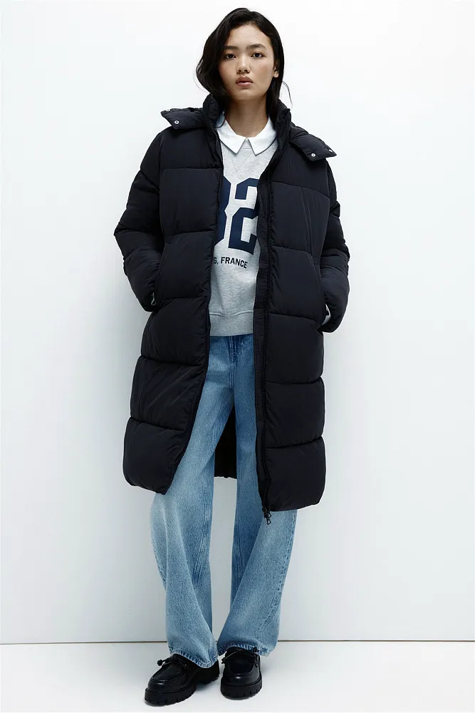 Длинный стеганый пуховик