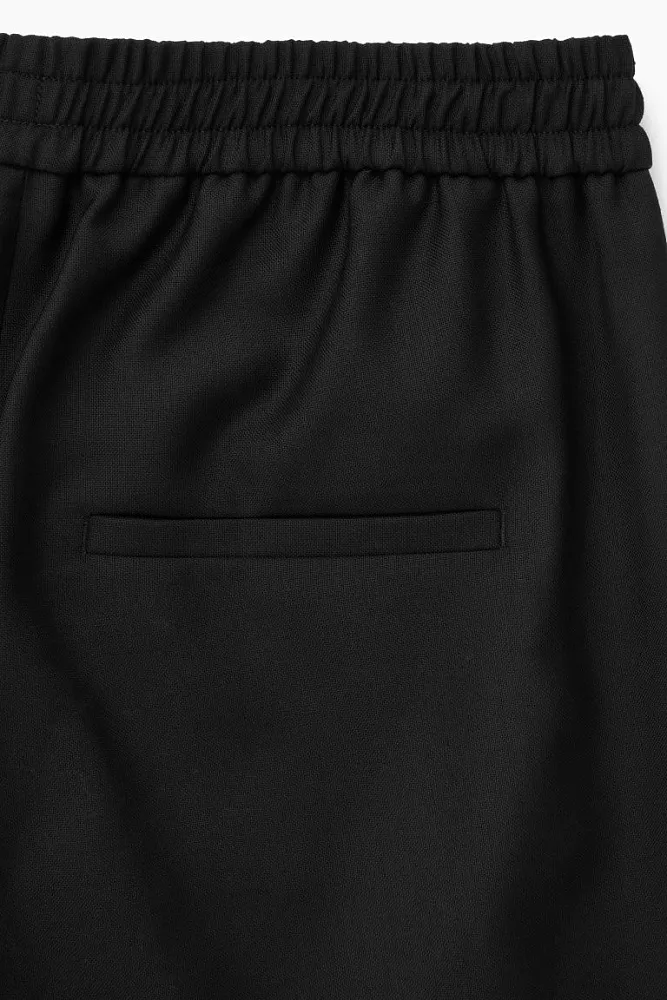 Шерстяные брюки с эластичным поясом COS