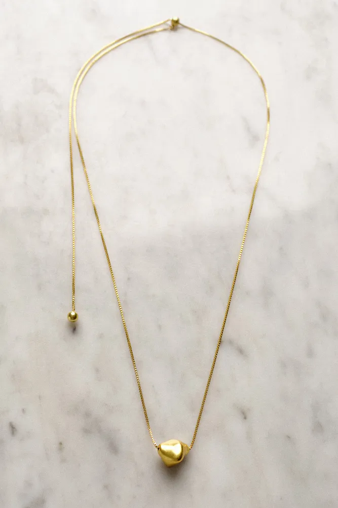 Ожерелье с расплавленным кулоном COS